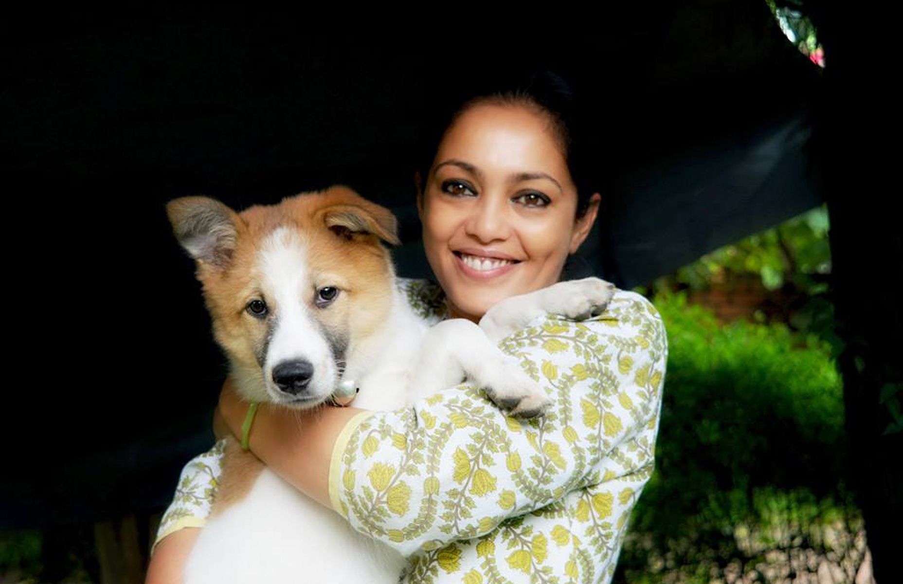 pramada shah holding dog